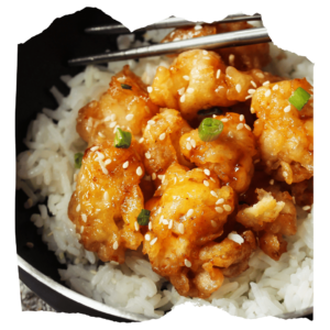 Sticky sesame chicken, steamed rice and flash fried green vegetables