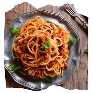 Italian style spaghetti bolognaise, caramelized carrots and caprese style salad with tomato, mozzarella and pesto