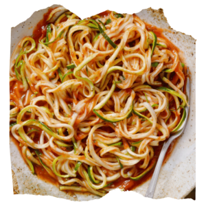 Vegetarian Zucchini Noodles with Sauteed Mushrooms. Cauli-Cream and a Zesty Side Salad
