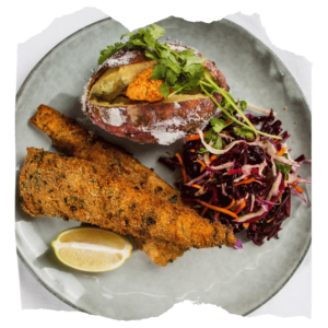 Parsley Crusted Oven Baked Hake with Red Cabbage and Beetroot Slaw and Salt Baked Sweet Potatoes with Harissa Butter